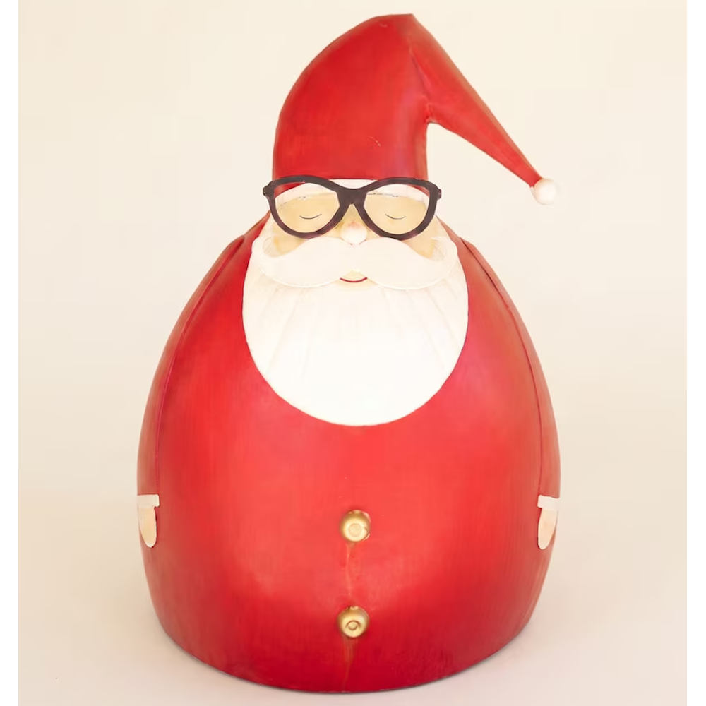 Large painted metal Santa sculpture wearing glasses against a plain background.