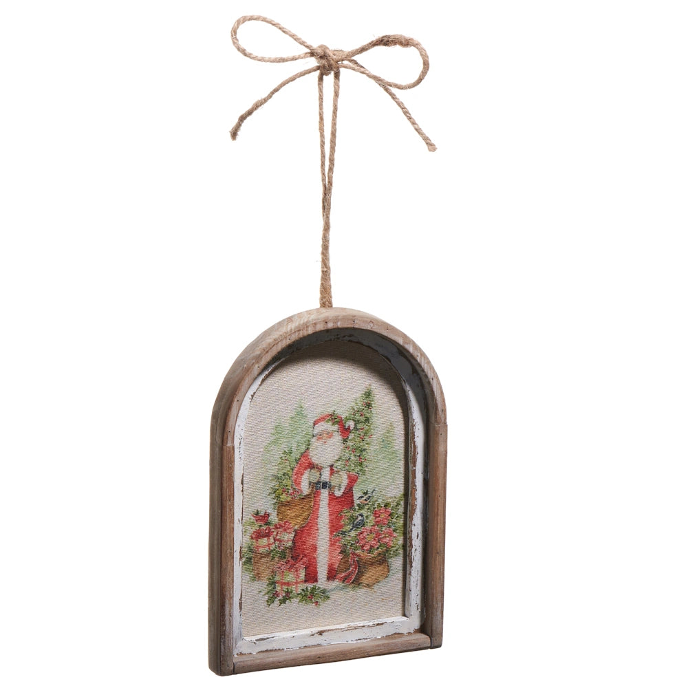 Arched wooden framed Christmas ornament featuring a watercolor-style illustration of Santa Claus with gifts and trees, hanging from a twine bow.