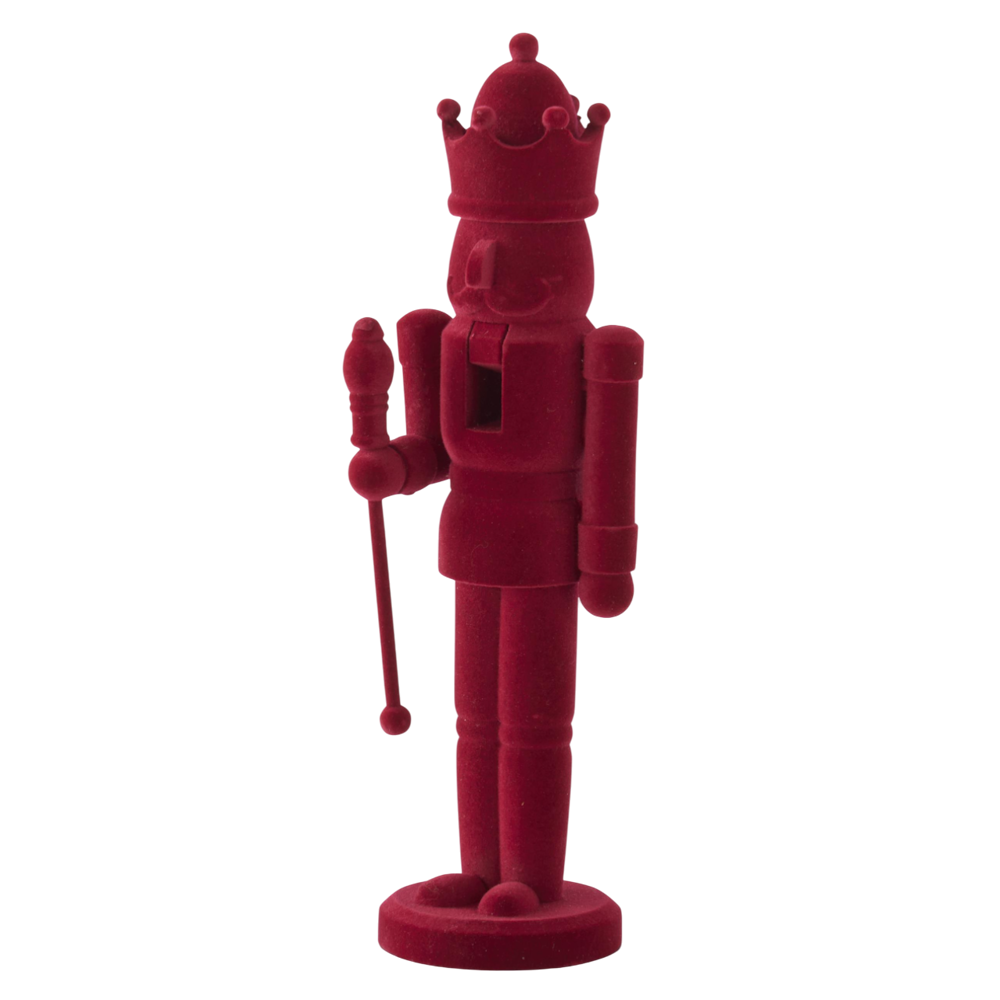 A wooden nutcracker king figure wearing a crown and holding a scepter, covered in a solid burgundy velvet texture.