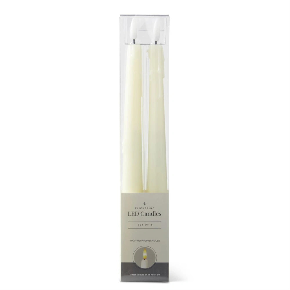 A set of two cream-colored LED taper candles in clear plastic packaging with a gray base label.