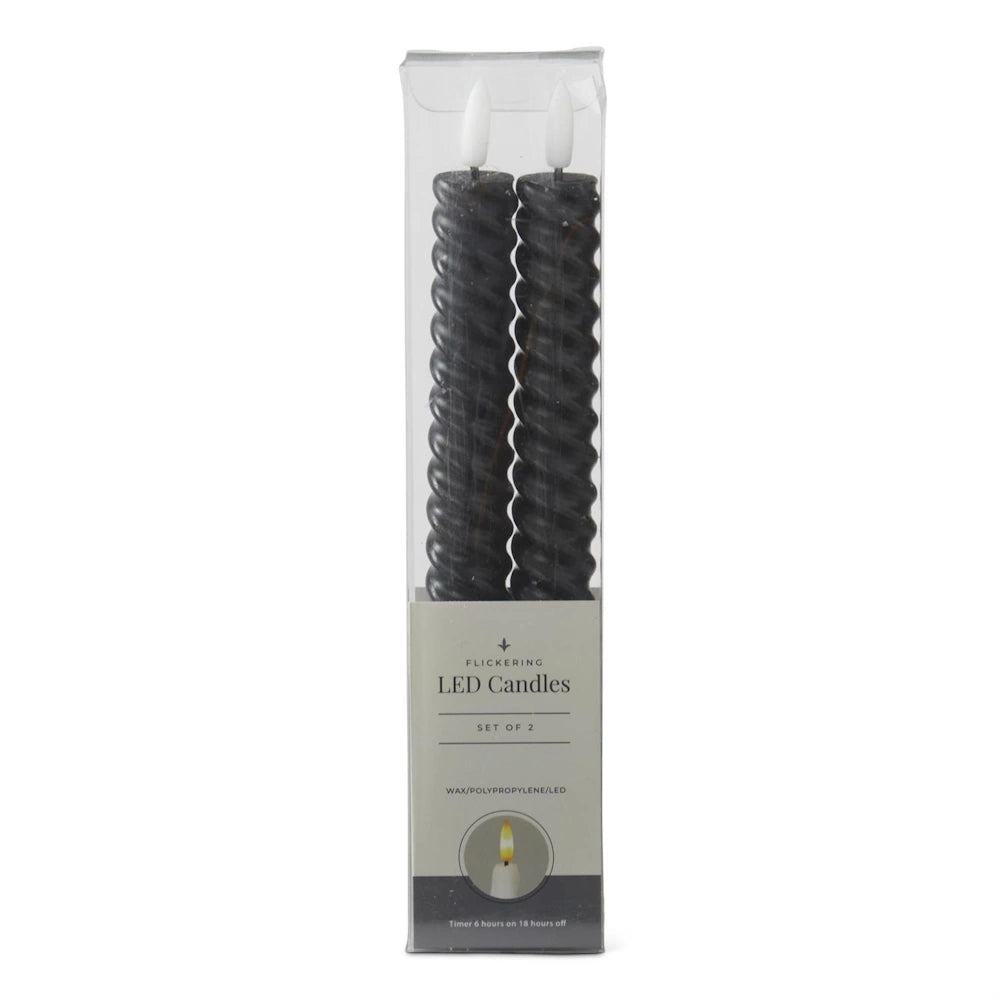 A pack of two black spiral LED taper candles in clear packaging with a grey base label.