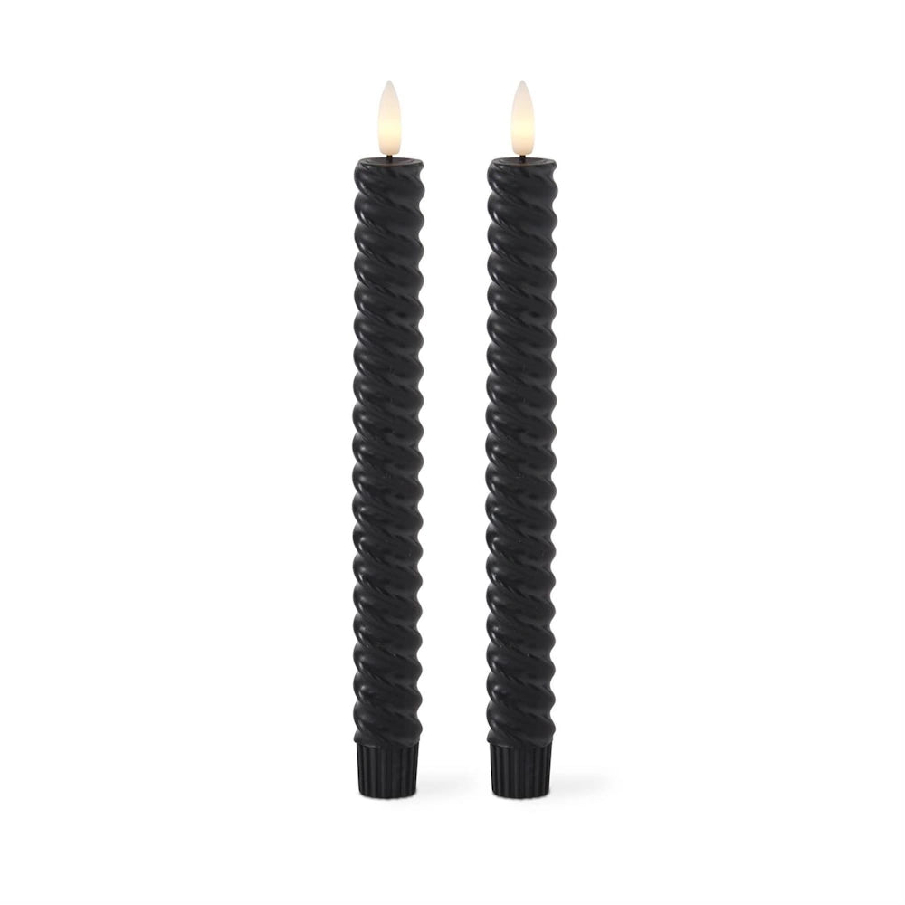 A set of two black spiral-twisted LED taper candles with glowing, flame-shaped tips.