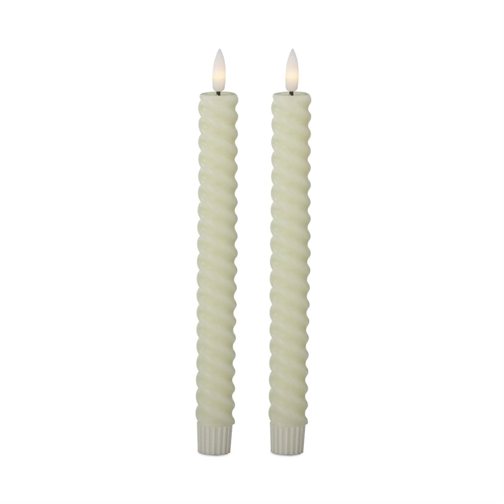 A pair of cream-colored spiral LED taper candles with glowing, flame-shaped tips.