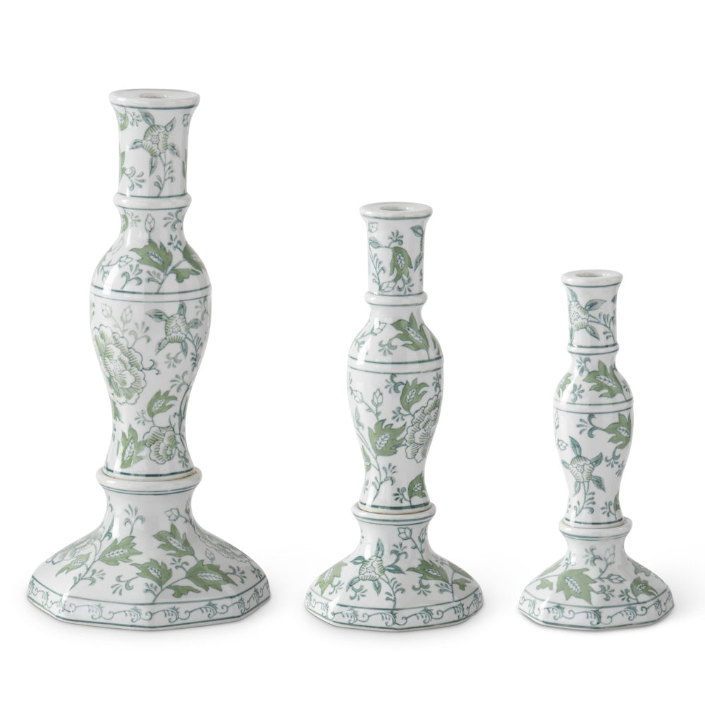 Set of 3 green and white floral ceramic taper candle holders in varying heights. Vintage style SEO home decor.