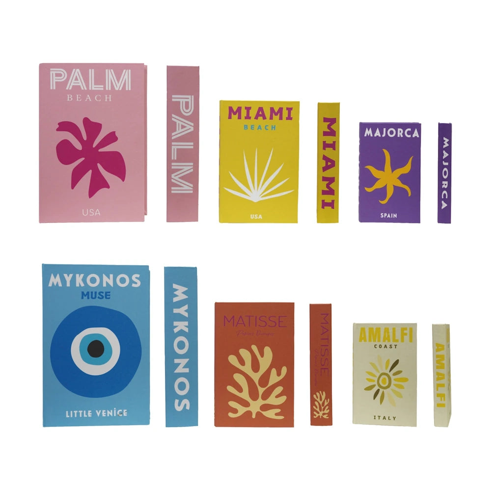 Colorful travel coffee table book set featuring Palm Beach, Miami, Mykonos, and Amalfi Coast cover designs.