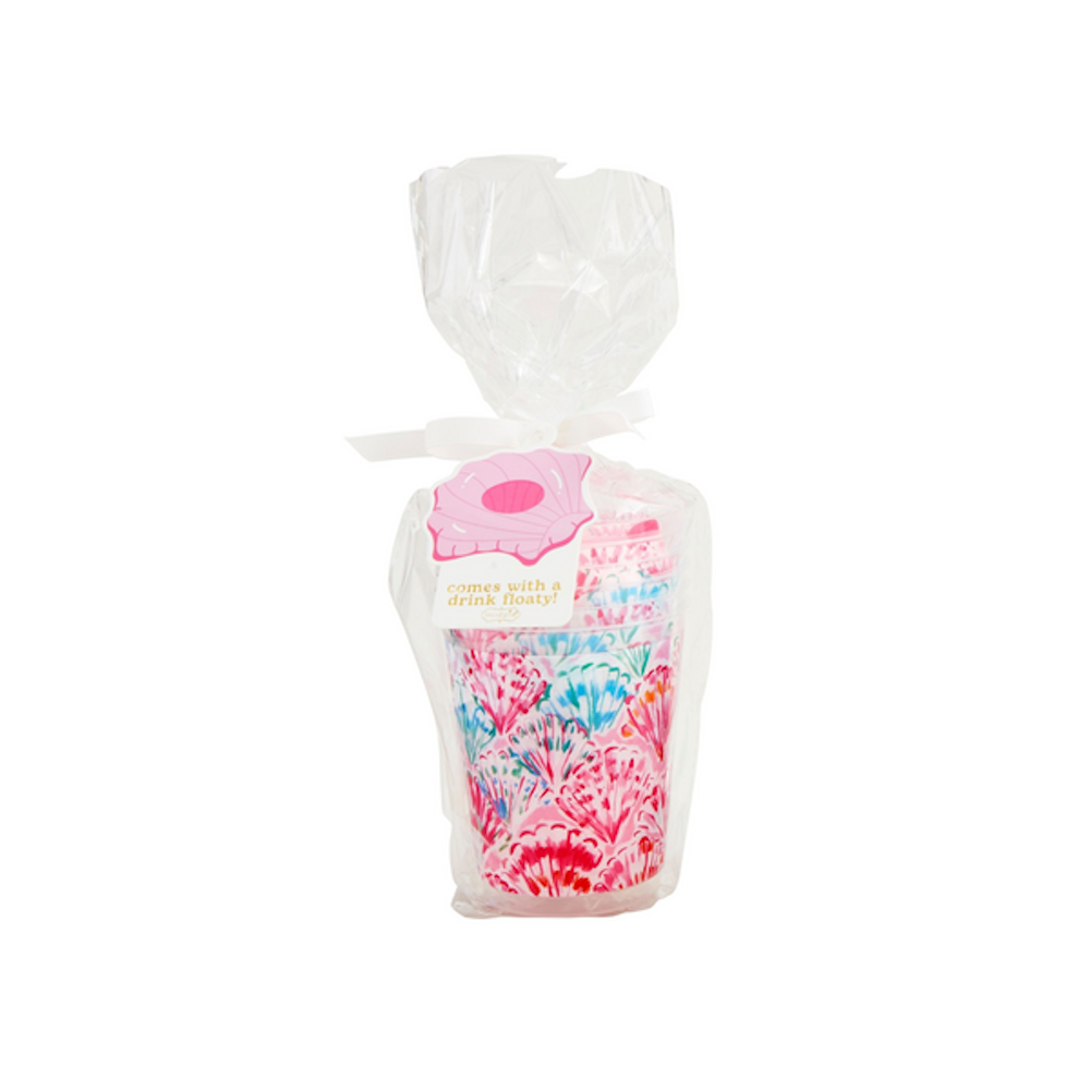 Stacked party cups with a colorful seashell pattern wrapped in clear plastic packaging with a ribbon.