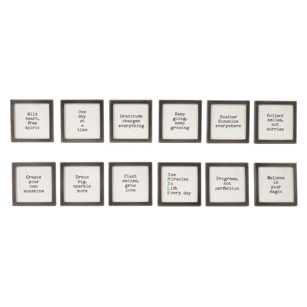 A collection of twelve square silver-framed magnets featuring various inspirational quotes.