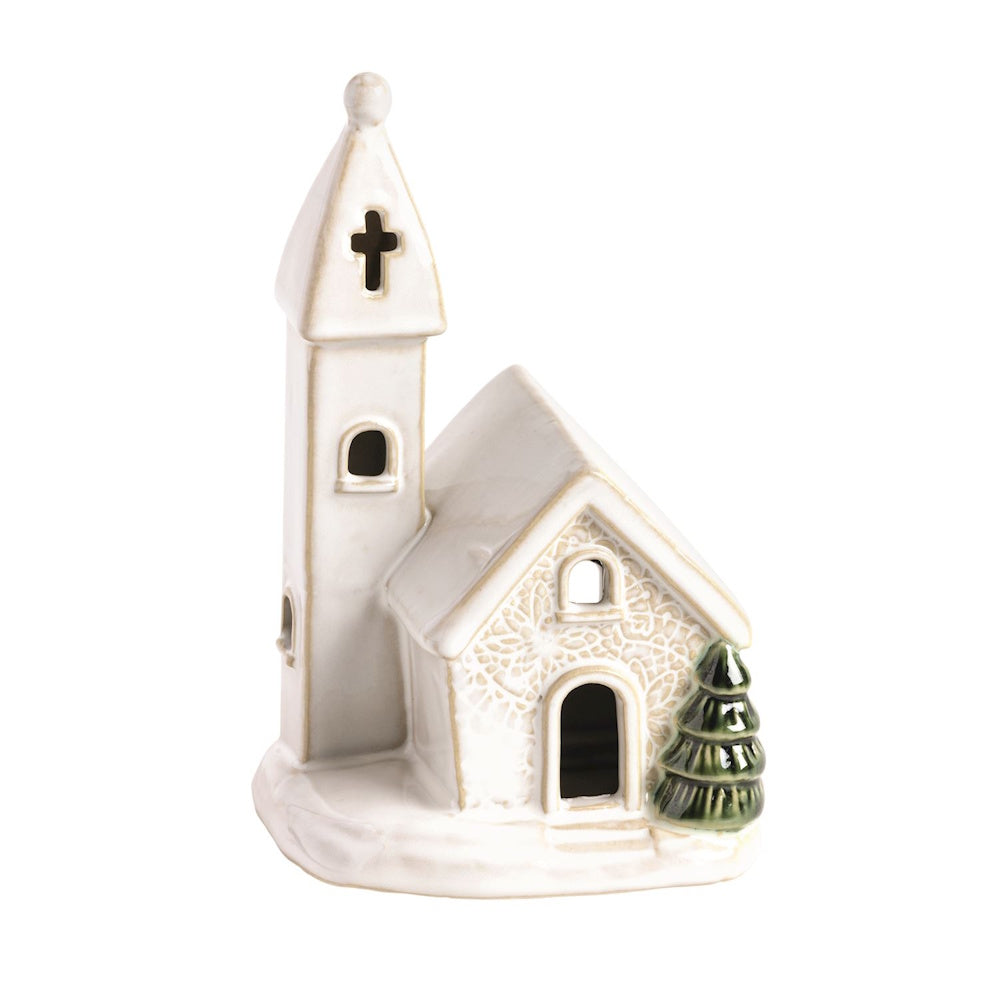 White ceramic church figurine featuring pressed lace textures and a small green evergreen tree.