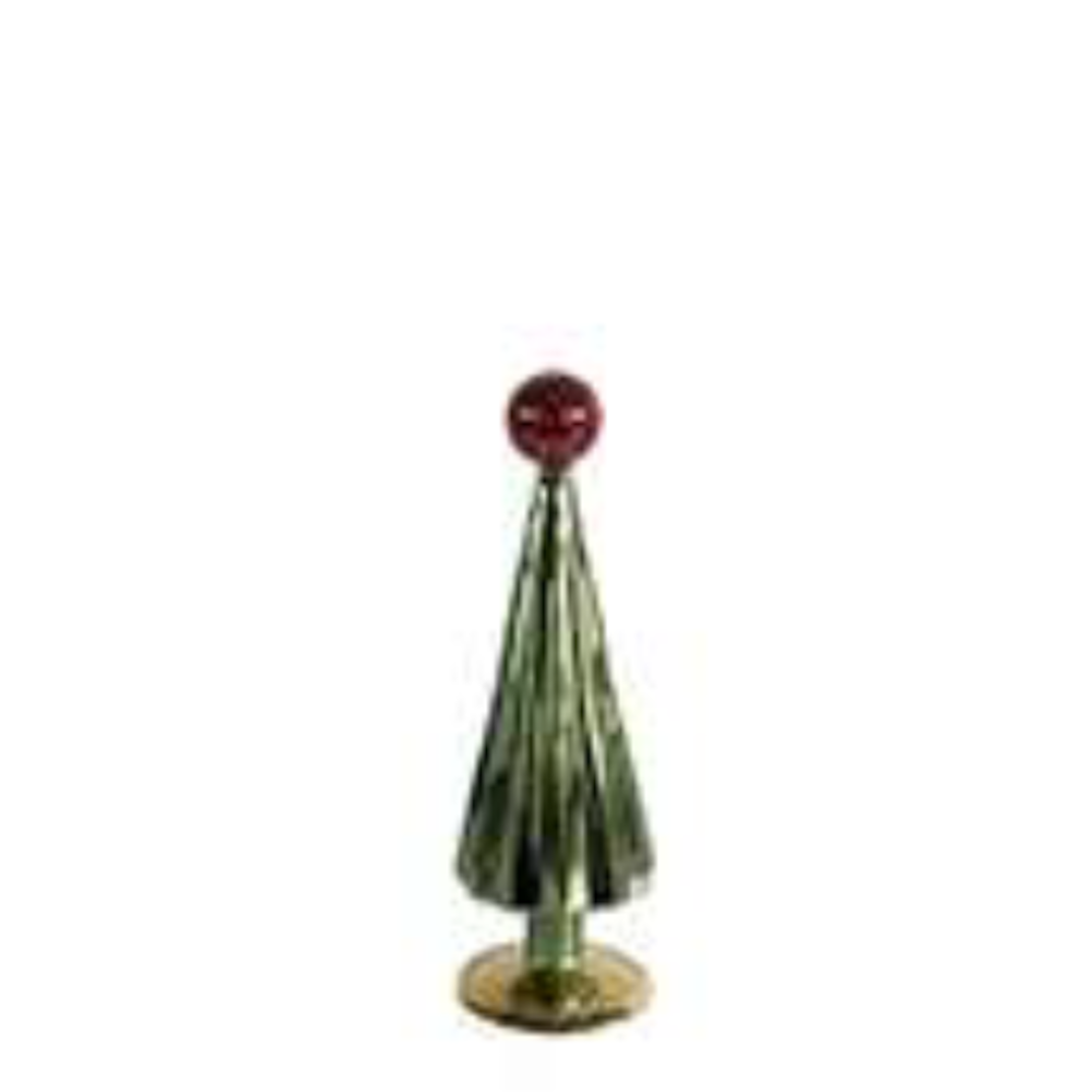 Small green glass Christmas tree figurine with a red topper from a front view.