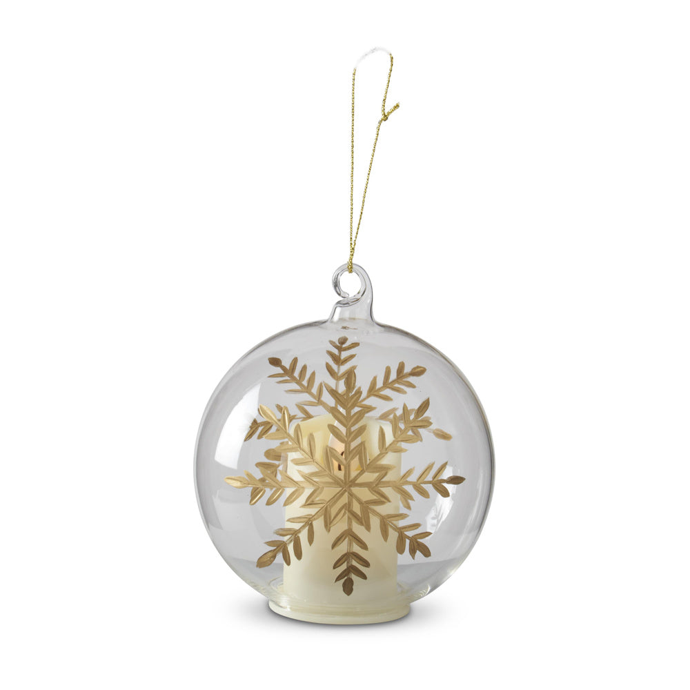 LED clear glass spherical ornament featuring a gold-gilded etched snowflake design and an internal candle.
