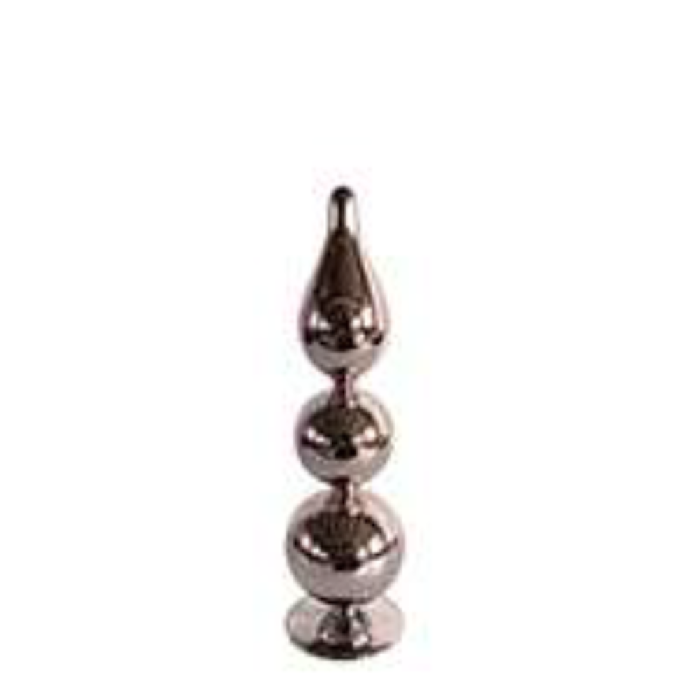 Small pink glass stacked ball Christmas tree figurine from a front view.