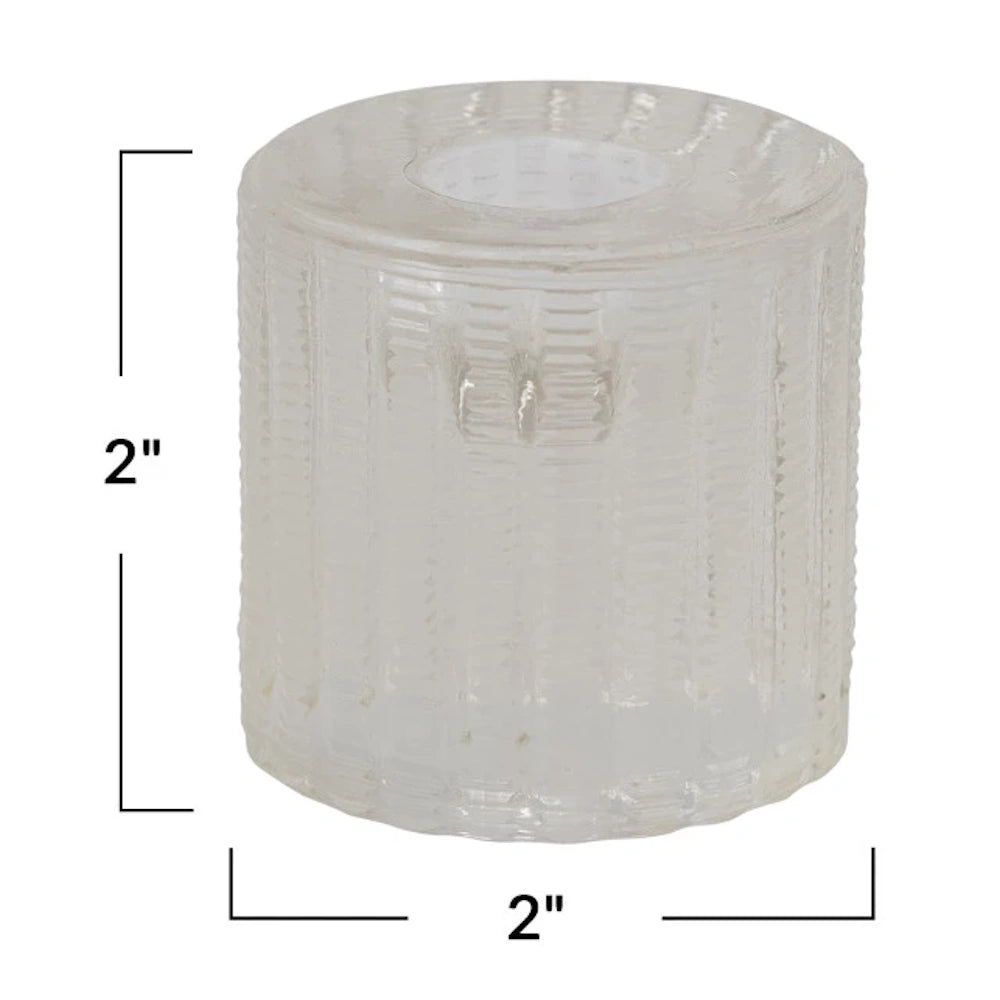 Cylindrical clear ribbed glass taper candle holder, 2 inches by 2 inches, minimalist modern home decor.