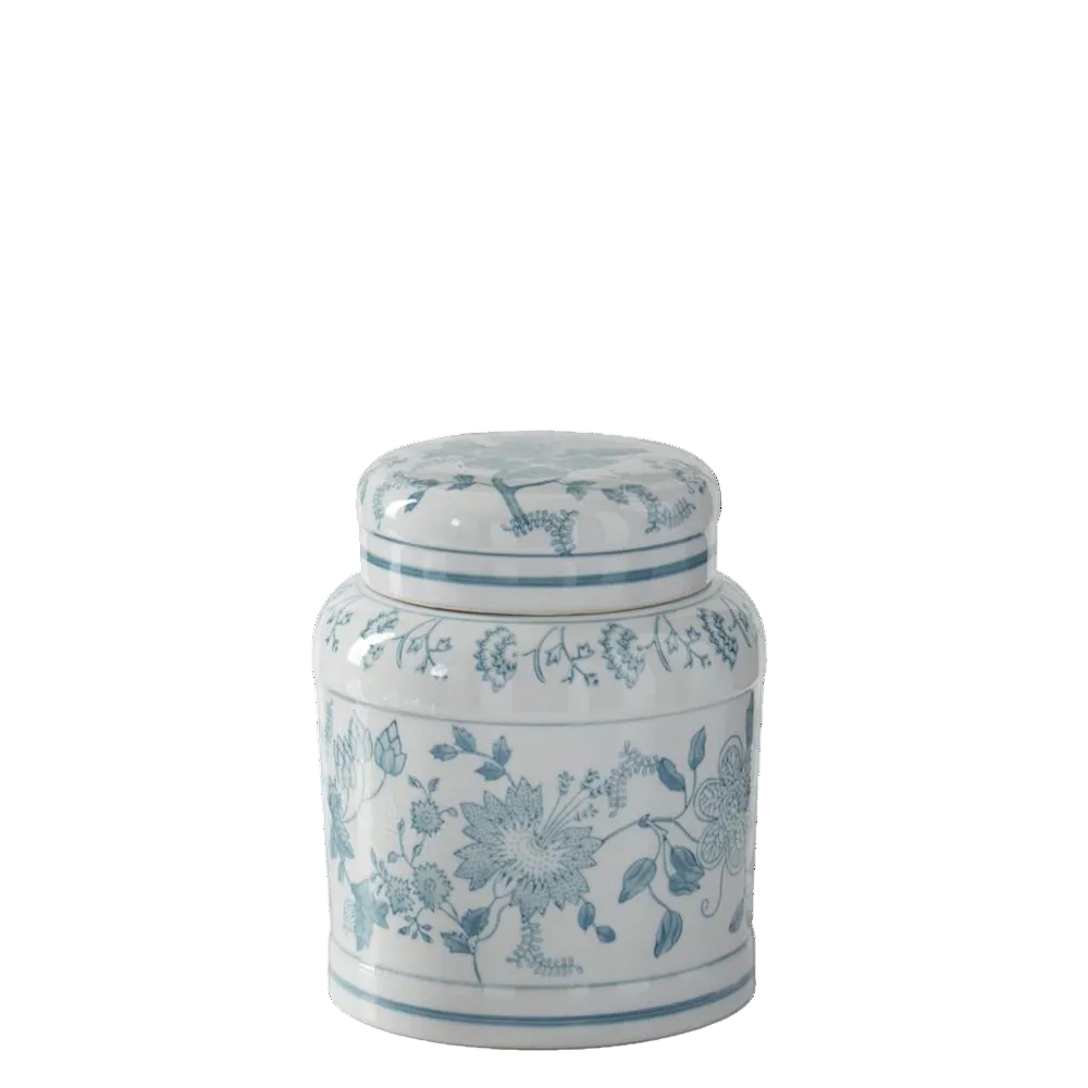 Small teal and white porcelain chinoiserie lidded jar with floral patterns and a matching lid on a white background.