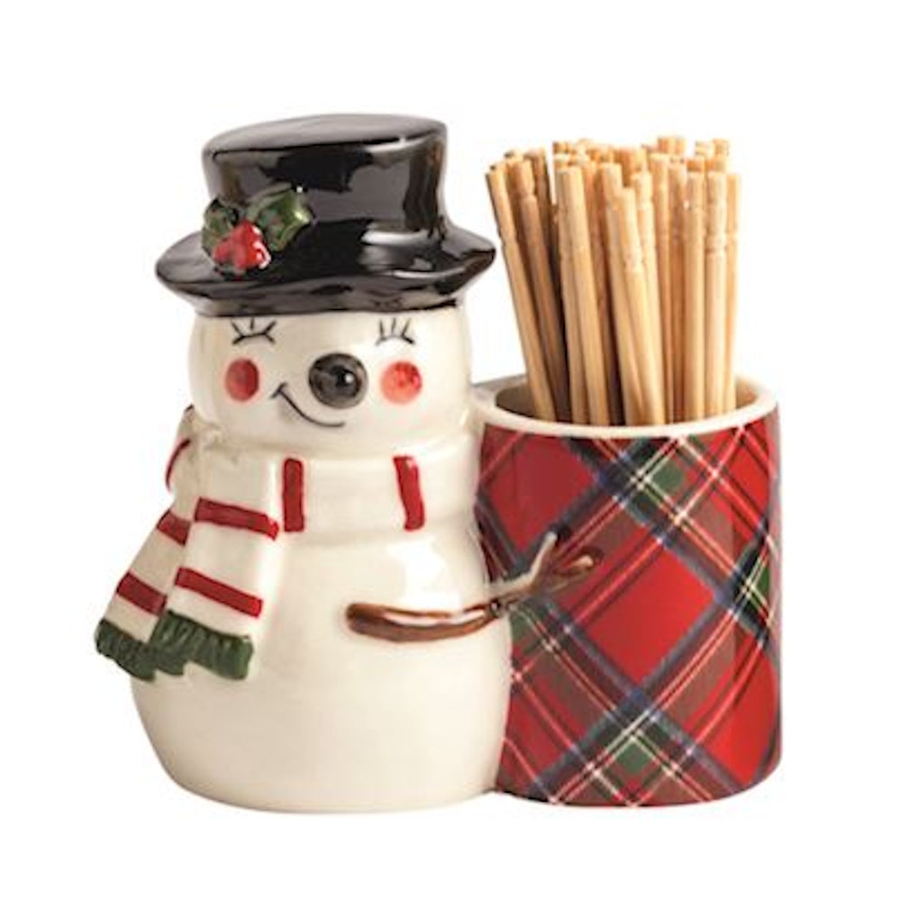 Ceramic snowman figurine wearing a top hat next to a red plaid caddy filled with toothpicks.