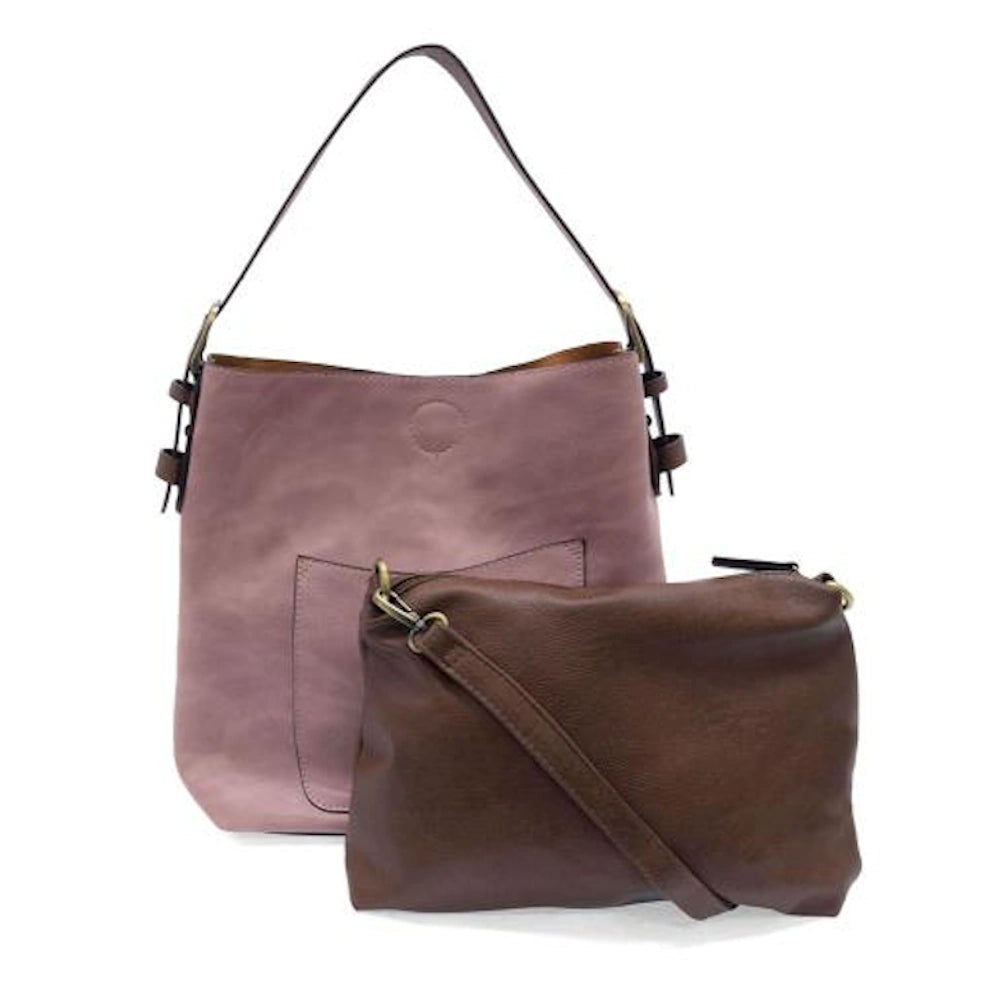 Soft berry hobo handbag with a coffee brown handle, paired with a matching brown crossbody bag on a white background.