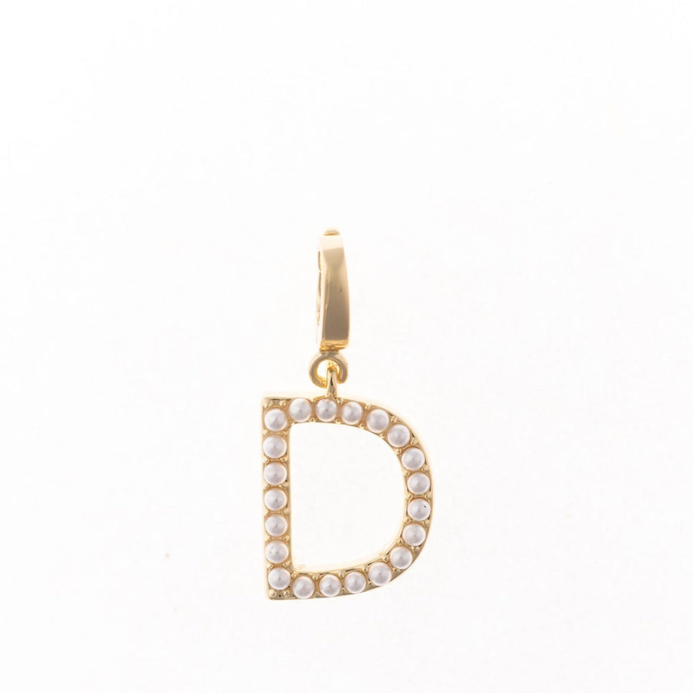 Gold letter 'D' charm studded with small white faux pearls on a plain white background.