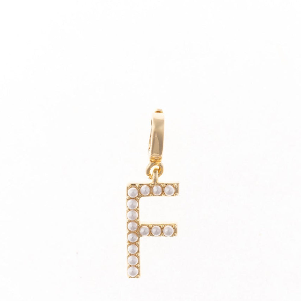 Gold letter 'F' charm studded with small white faux pearls on a plain white background.