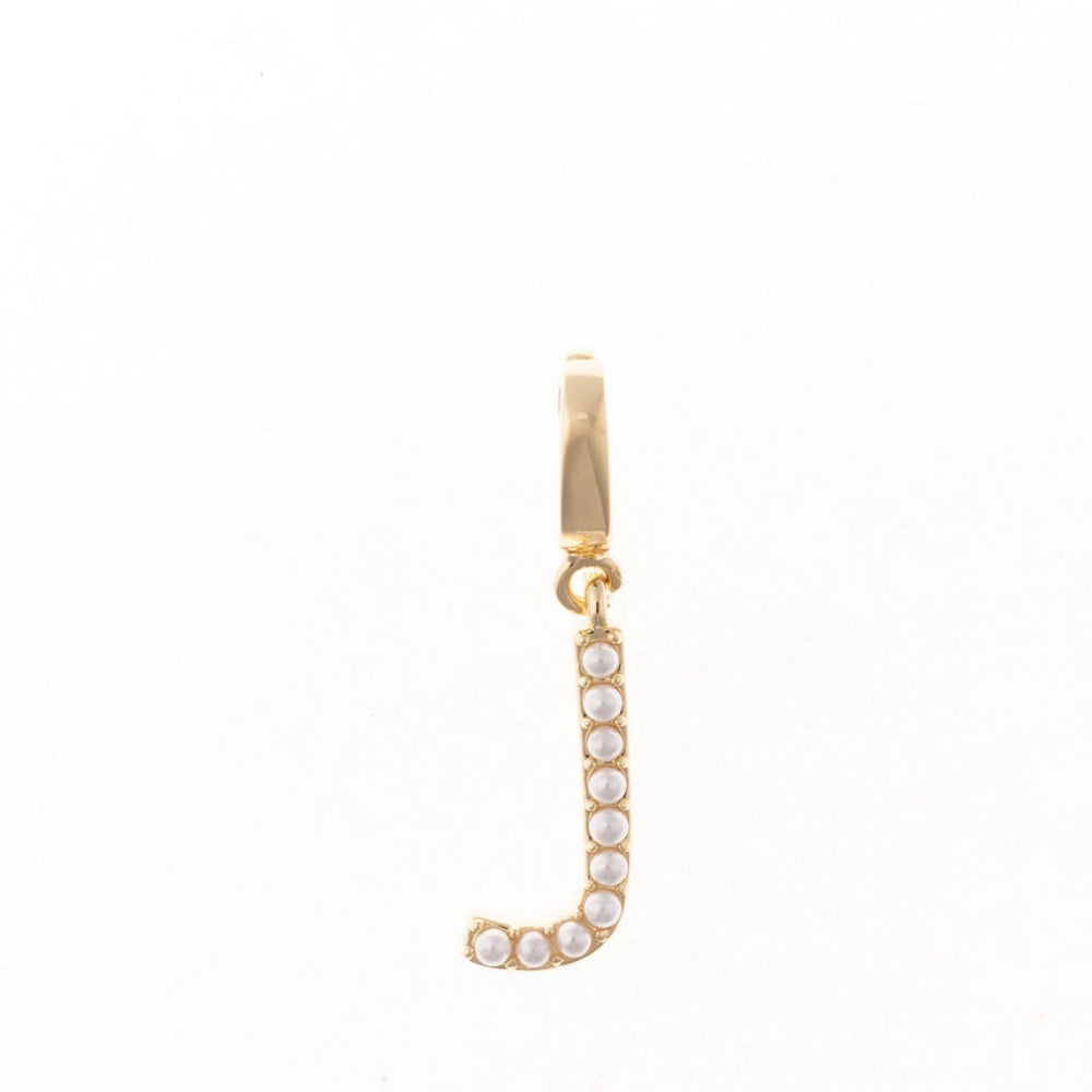 Gold letter 'J' charm studded with small white faux pearls on a plain white background.