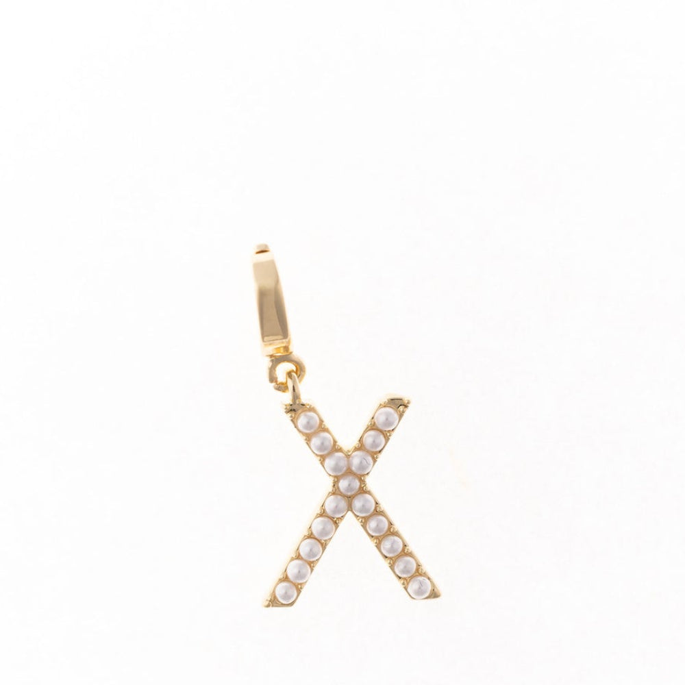 Gold letter 'X' charm studded with small white faux pearls on a plain white background.