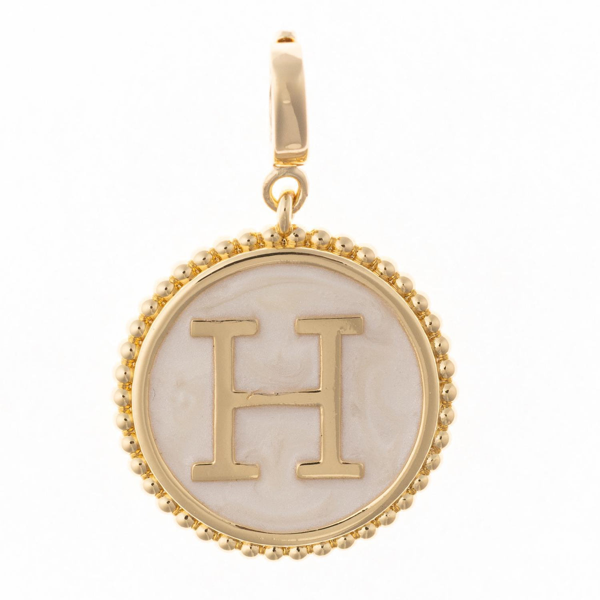 Round gold pendant charm with faux mother-of-pearl inlay, featuring the capital letter "H" and a beaded edge.