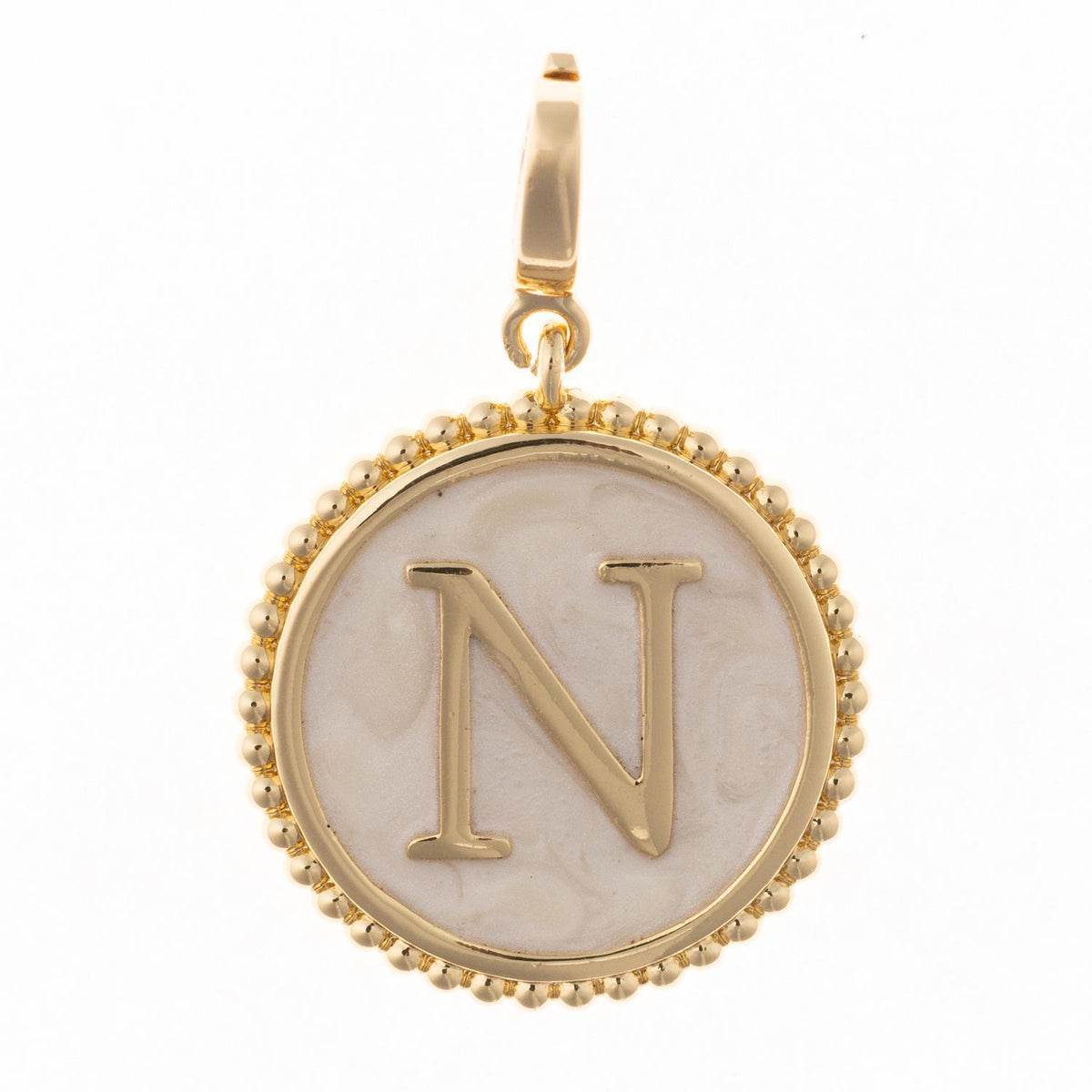 Round gold pendant charm with faux mother-of-pearl inlay, featuring the capital letter "N" and a beaded edge.