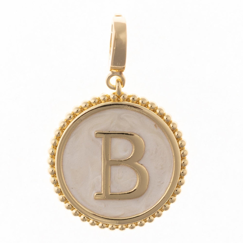 Round gold pendant charm with faux mother-of-pearl inlay, featuring the capital letter "B" and a beaded edge.