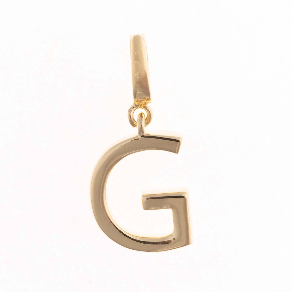 Gold charm pendant shaped in the capital letter "G" with a polished finish and top attachment bail.
