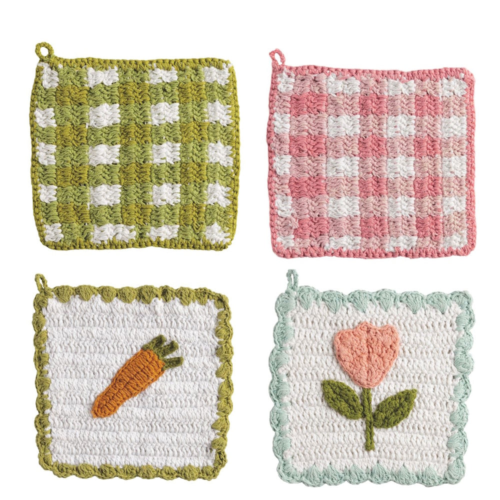 Four crochet pot holders with spring designs: green and pink gingham, an orange carrot, and a pink tulip on white.