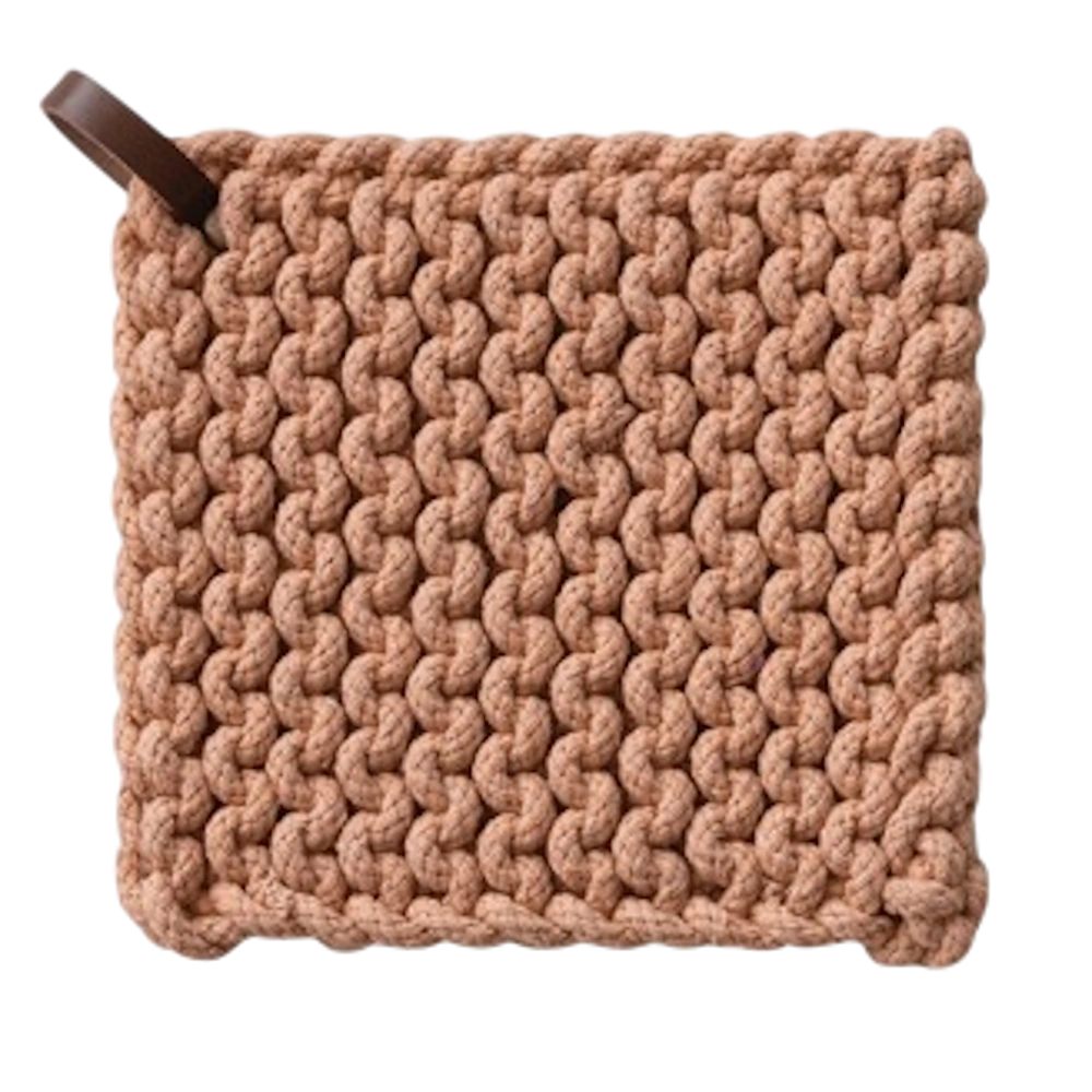 Orange square crocheted cotton pot holder featuring a thick textured weave and a brown leather hanging loop.