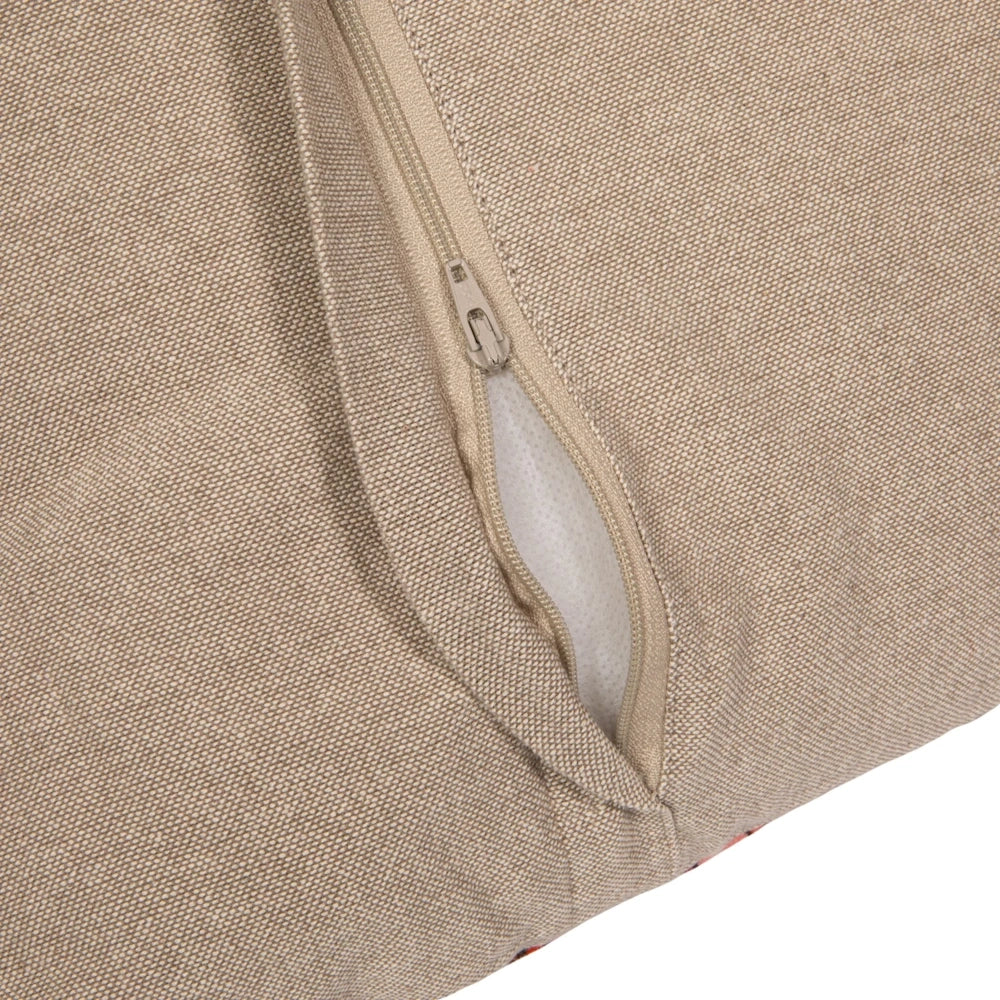 Close-up of a hidden zipper on a beige linen throw pillow cover, showcasing durable fabric texture.