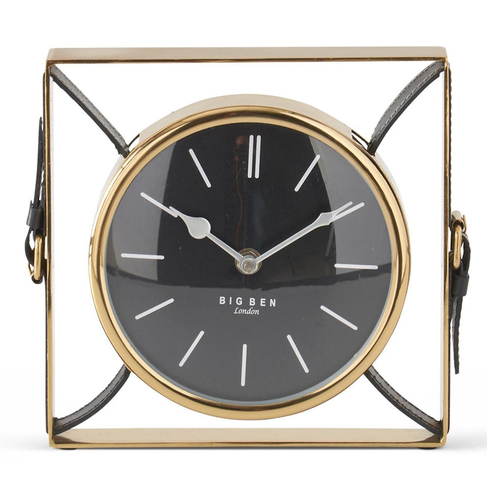 Square gold metal table clock with black face and leather strap accents. Big Ben London branding on a white background.