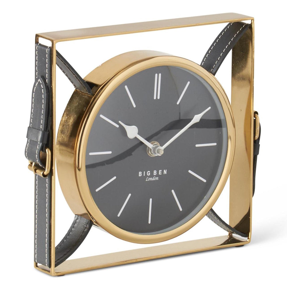 Square gold metal table clock with a black face and leather strap accents. Big Ben London branding on the dial.