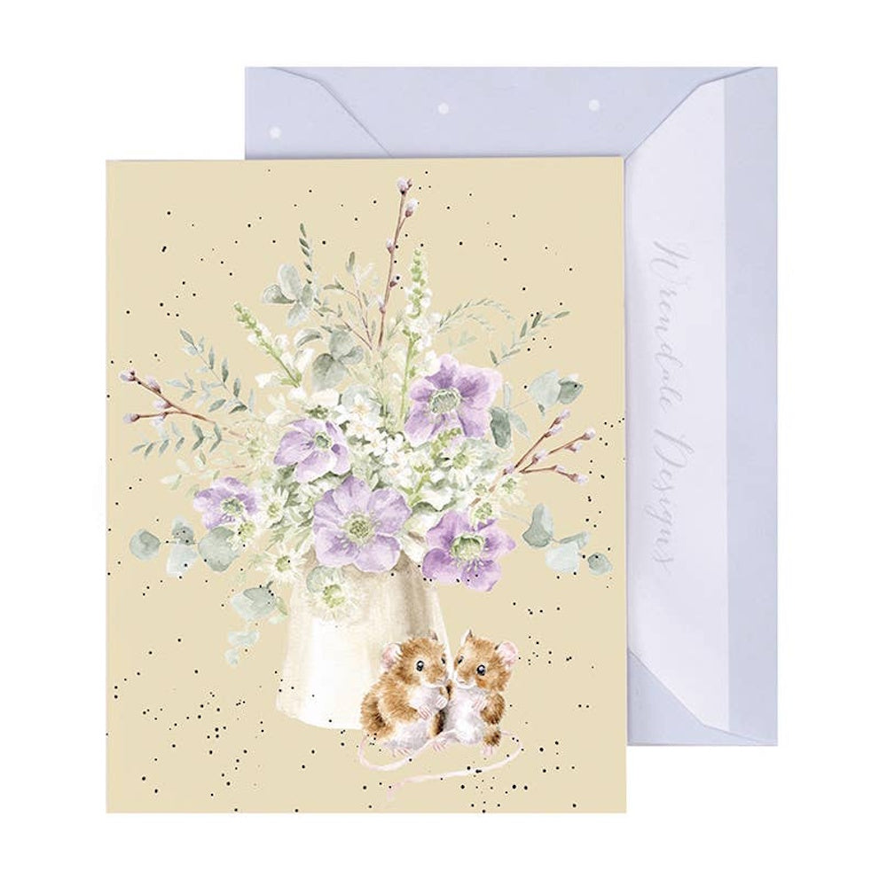Watercolor illustration of two cute mice sitting by a vase of purple flowers on a cream card with a white envelope.