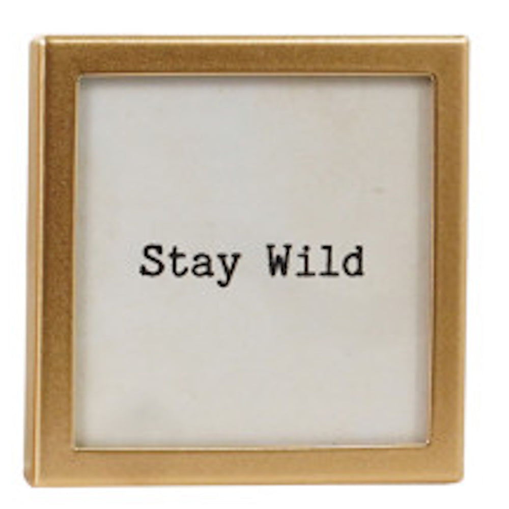 Square gold-framed magnet with text "Stay Wild".