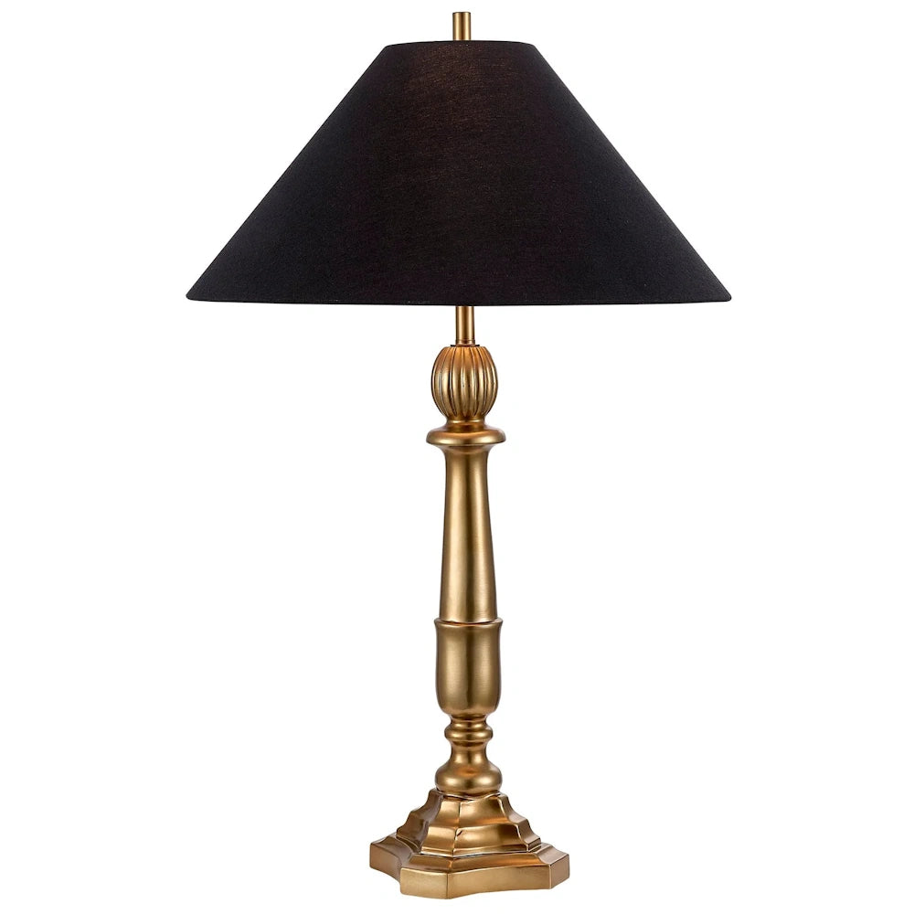 Elegant gold candlestick table lamp with a black tapered fabric lampshade on a white background.