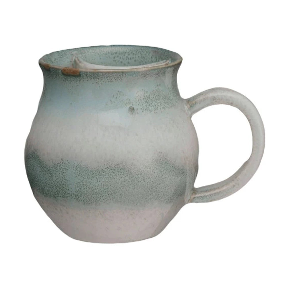 Blue-green and white artisanal stoneware mustache mug with a ceramic guard, single item view.