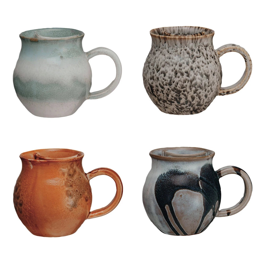 Four handmade ceramic mustache mugs in various stoneware glazes: blue, speckled, amber, and black/grey.