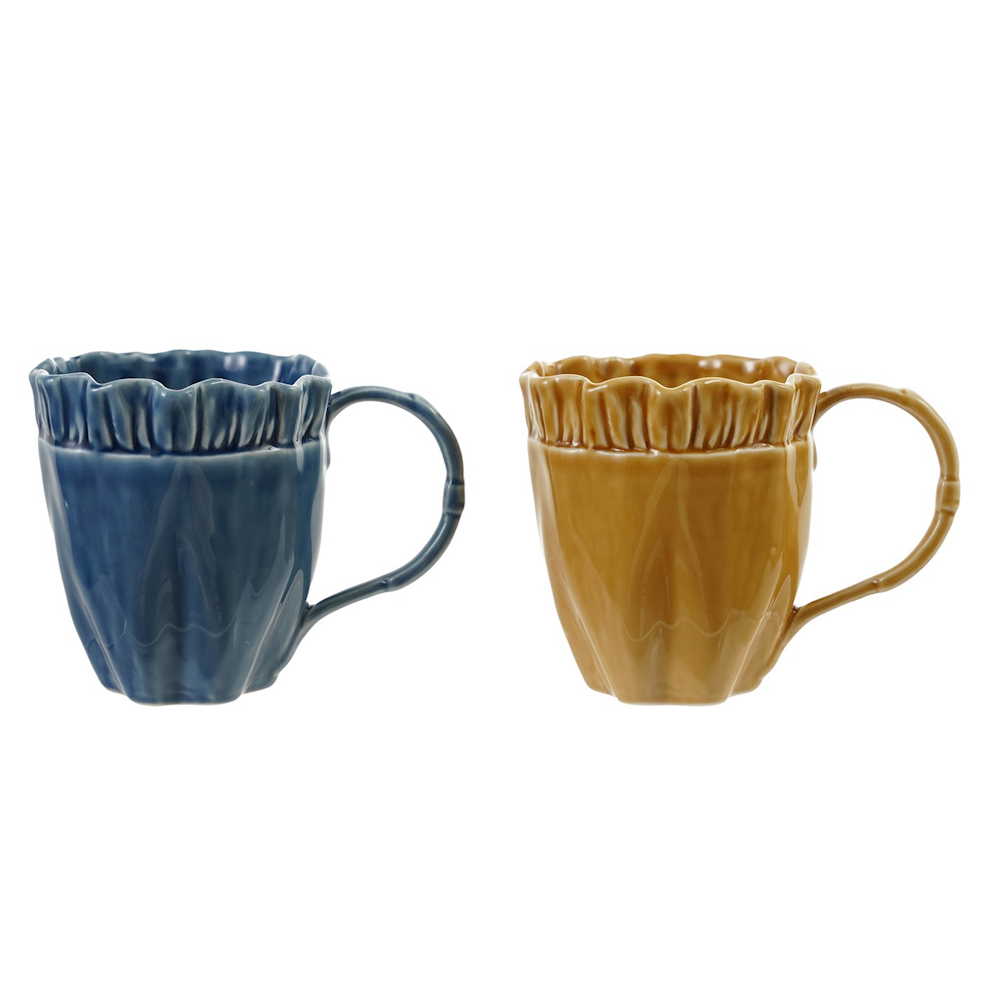Glossy blue and yellow ceramic mugs with ruffled rims and slender handles against a white background.