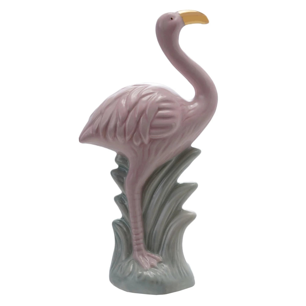 Decorative pink flamingo sculpture with metallic gold accent, pastel tropical animal figurine for interior design.