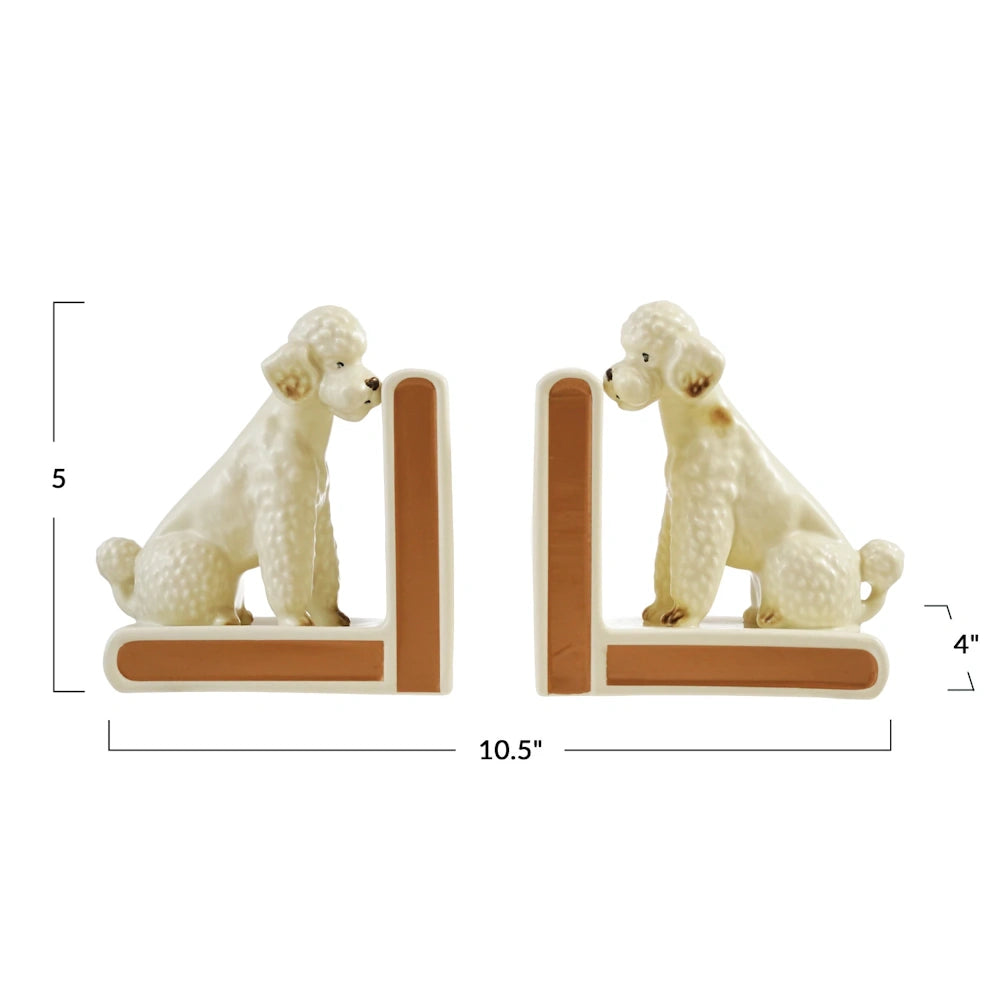 White ceramic poodle bookends with brown trim, measuring 10.5 inches wide and 5 inches tall.