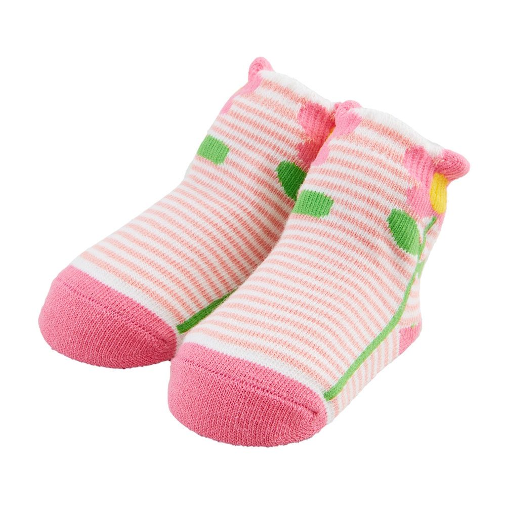 Pink and white striped baby socks with a pink flower and green leaf pattern on a plain white background.