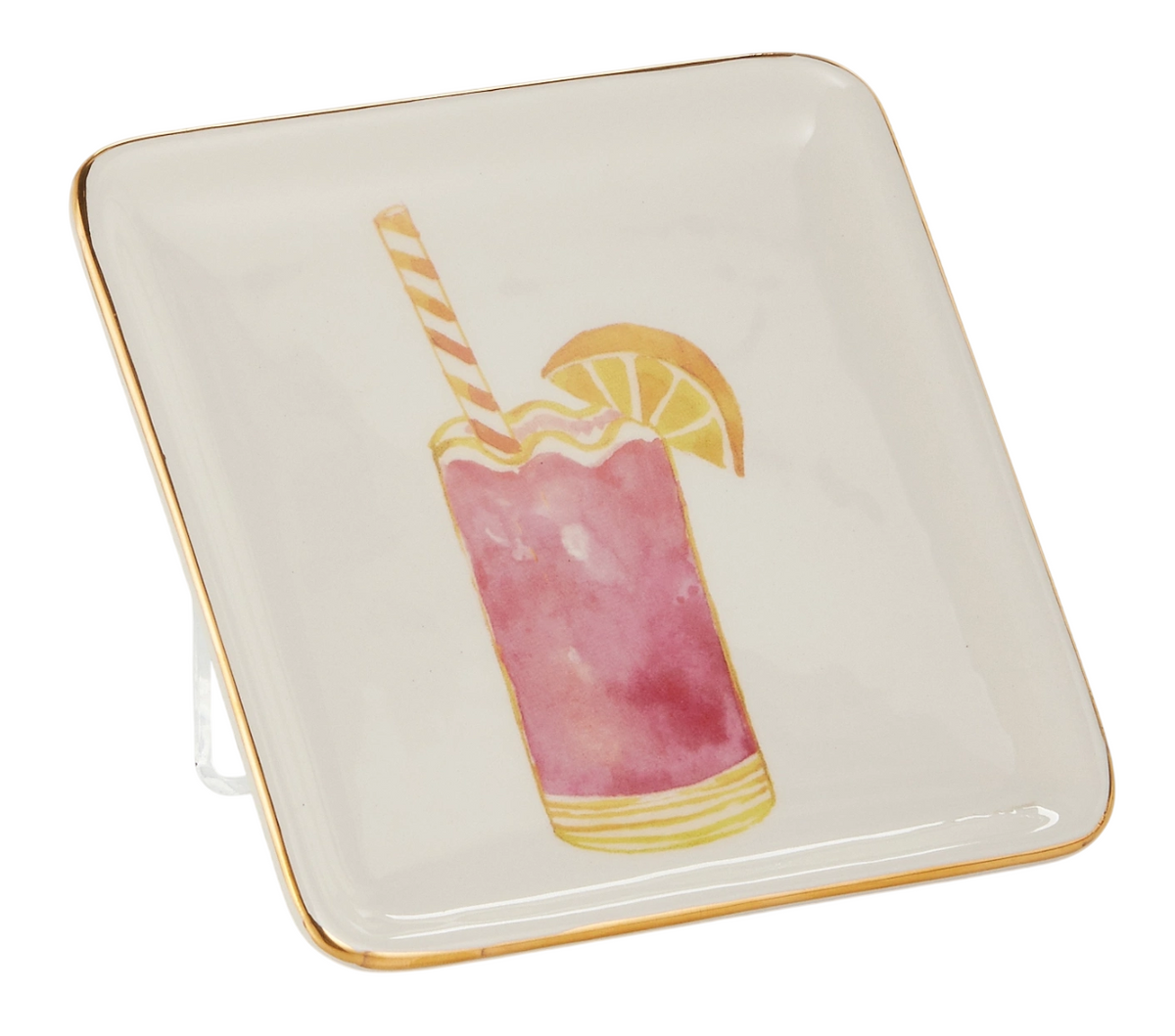 A square ceramic plate with a gold rim features a watercolor-style illustration of a pink drink, striped straw, and lemon slice, evoking a summery feel.