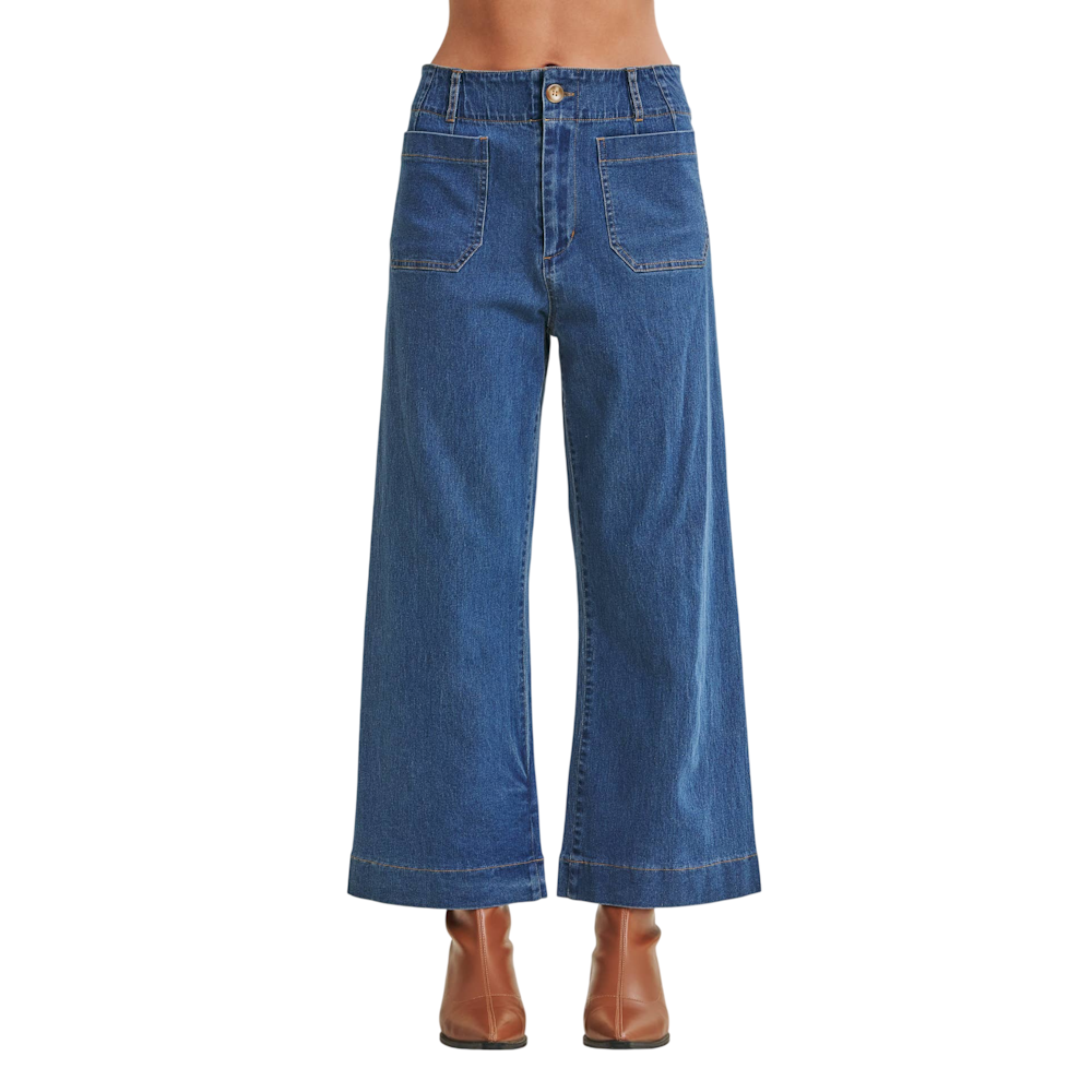 High-waisted wide-leg blue denim jeans featuring front patch pockets and an ankle-length hem.