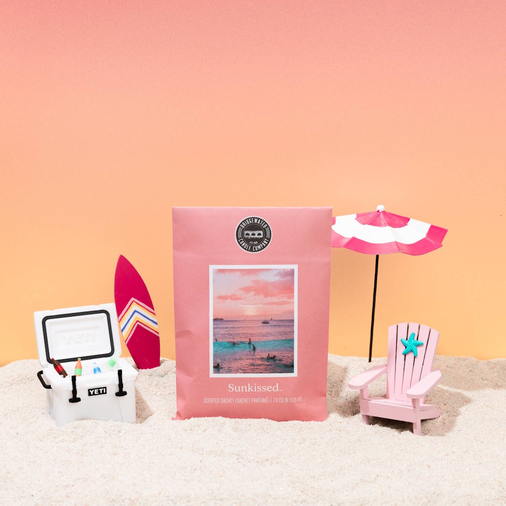 Bridgewater Candle Company Sunkissed scented sachet in a beach themed miniature display with a tiny cooler and chair.