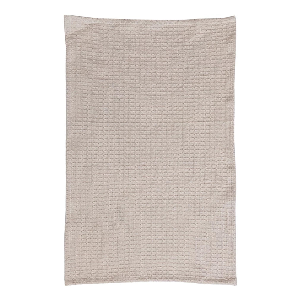 Tan cotton waffle-weave tea towel with a textured honeycomb pattern, ideal for kitchen drying and decor.