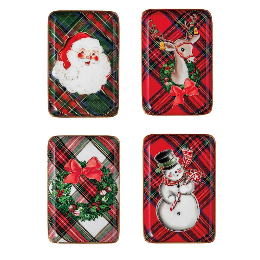 Set of four rectangular Christmas tidbit trays featuring illustrated holiday characters and a wreath against tartan backgrounds.