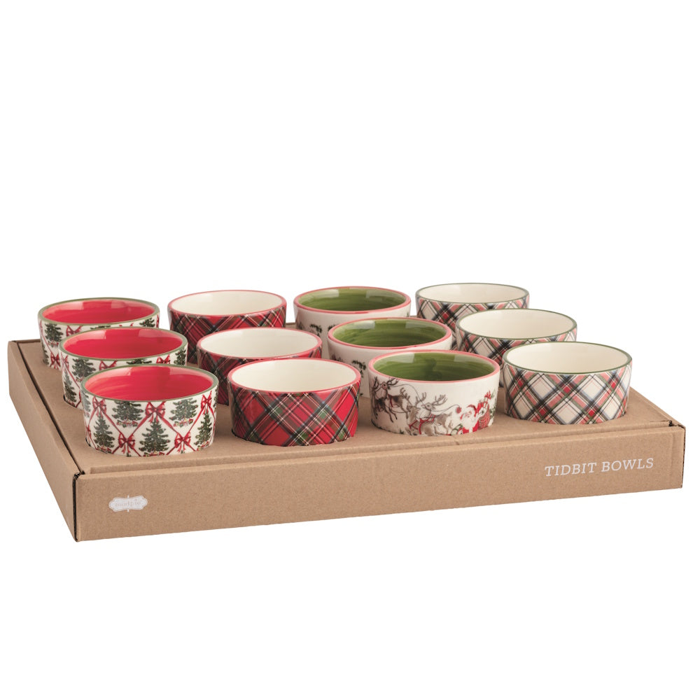 Front view of an assorted set of multicolored ceramic Christmas tidbit dishes displayed in a cardboard retail tray.