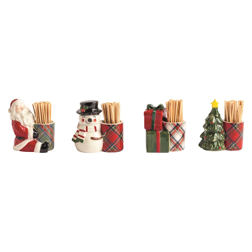 Set of four holiday ceramic toothpick holders featuring Santa, a snowman, presents, and a tree.