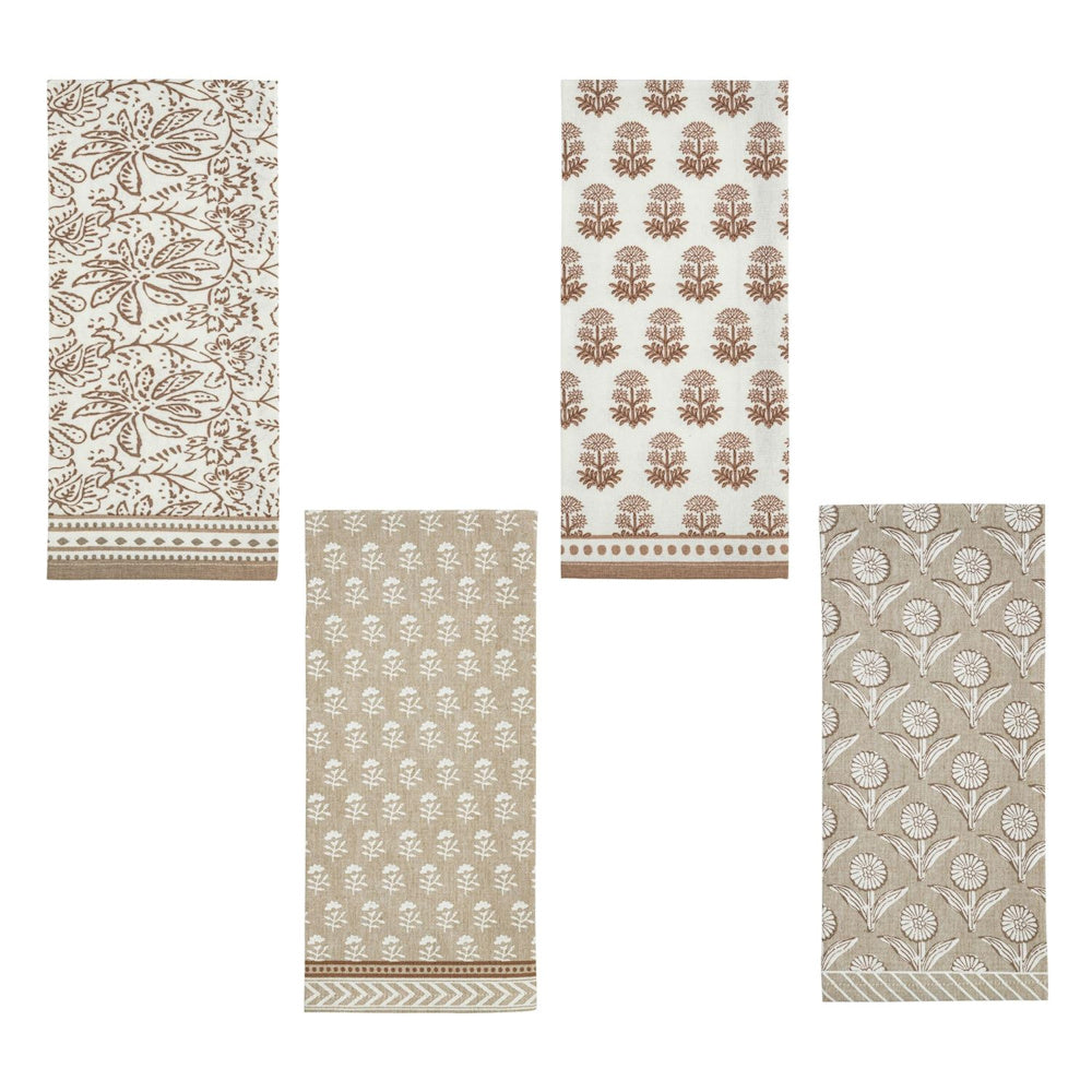 Set of four taupe and white cotton kitchen towels featuring various block-print style floral and botanical patterns.