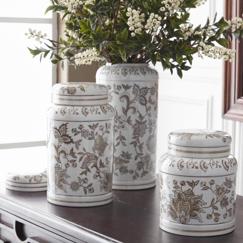 Taupe and white porcelain chinoiserie lidded jars with floral patterns, perfect for elegant home decor and storage.